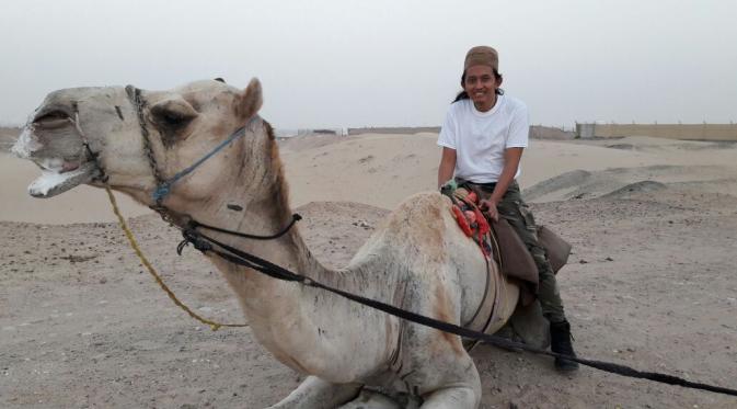 MUCHAMMAD KHAMIM SETIAWAN ON A CAMEL