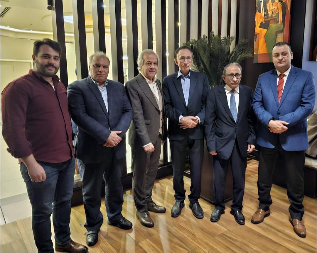 وزير الاقتصاد والتجارة الليبي مع حسام فيض الله لوضع بروتوكول ديفيليه ليبيا الدولي