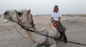 MUCHAMMAD KHAMIM SETIAWAN ON A CAMEL